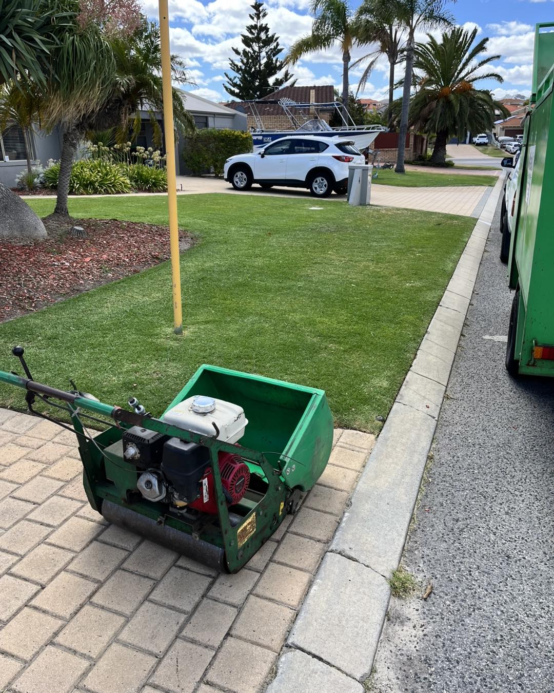 MaKo Lawn Care trailer on site